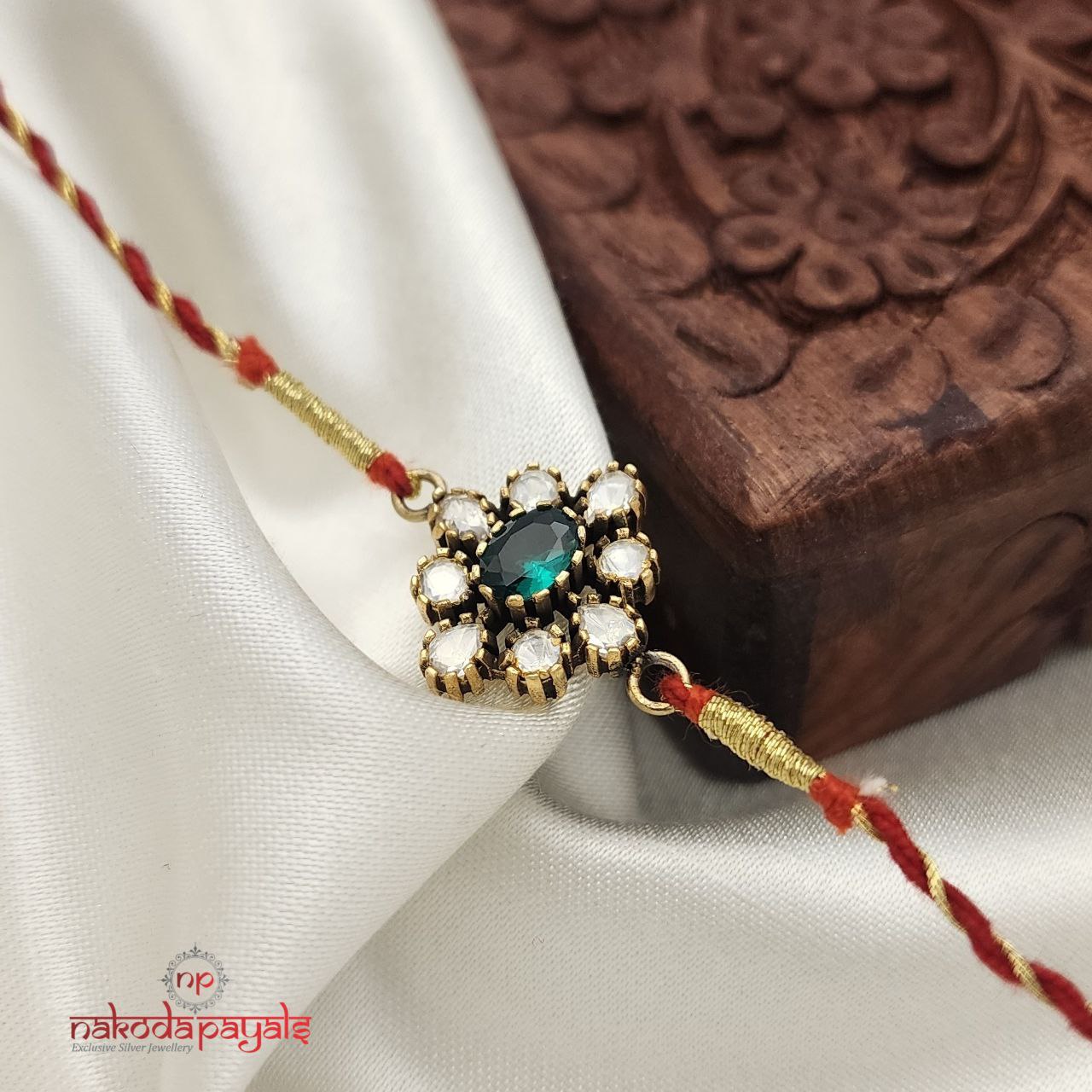 Vibrant Green Moissanite Rakhi R5645