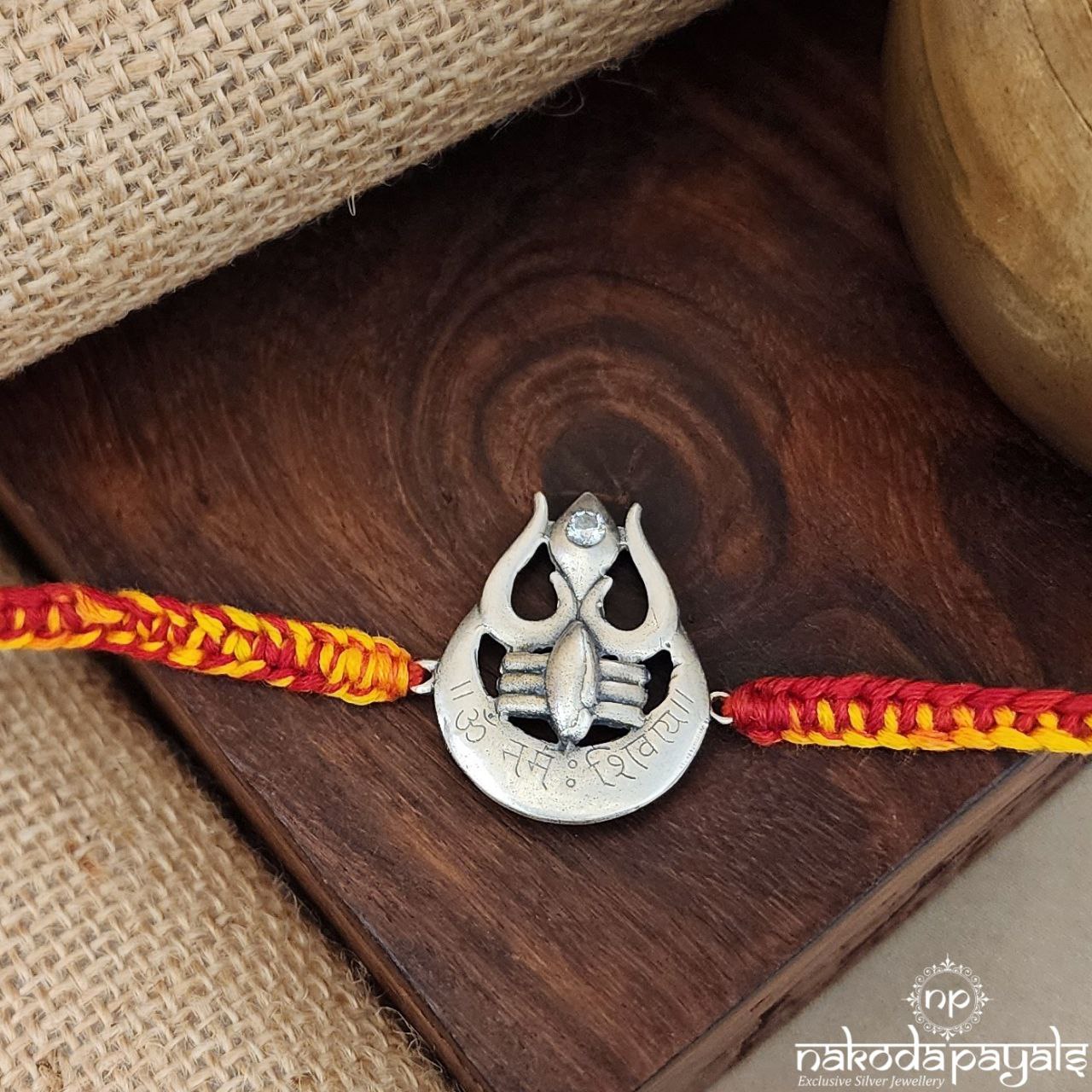 Trident On Moon Rakhi (R1612)