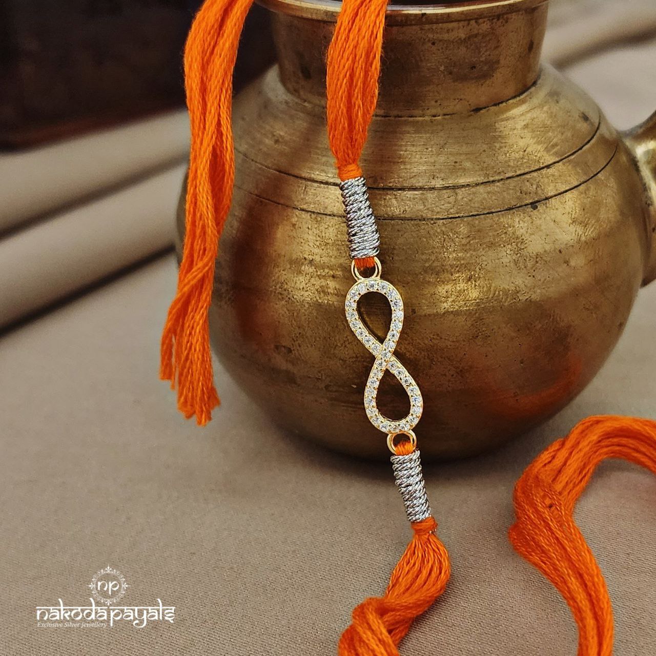 Orange Rose Gold Infinity Love Rakhi (R5657)