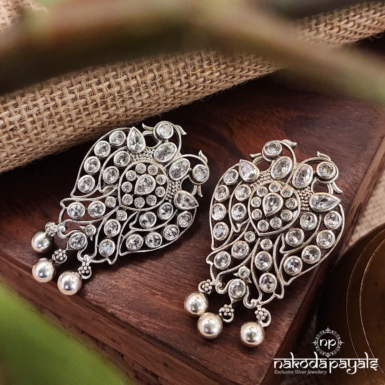 White Anti Peacock Studs (C1918)