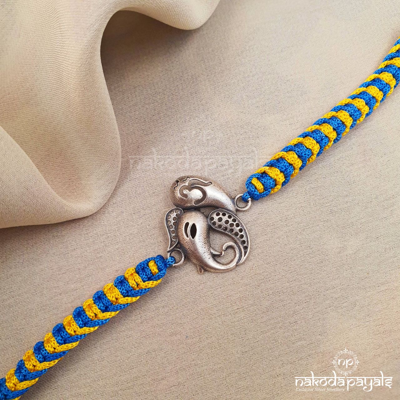 Ganesha OM Rakhi (R5477)